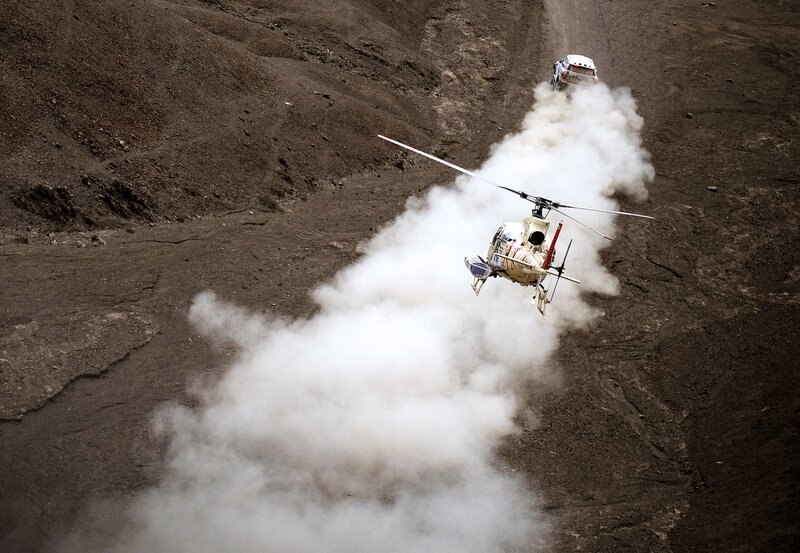 Helicopter and Car in Dust