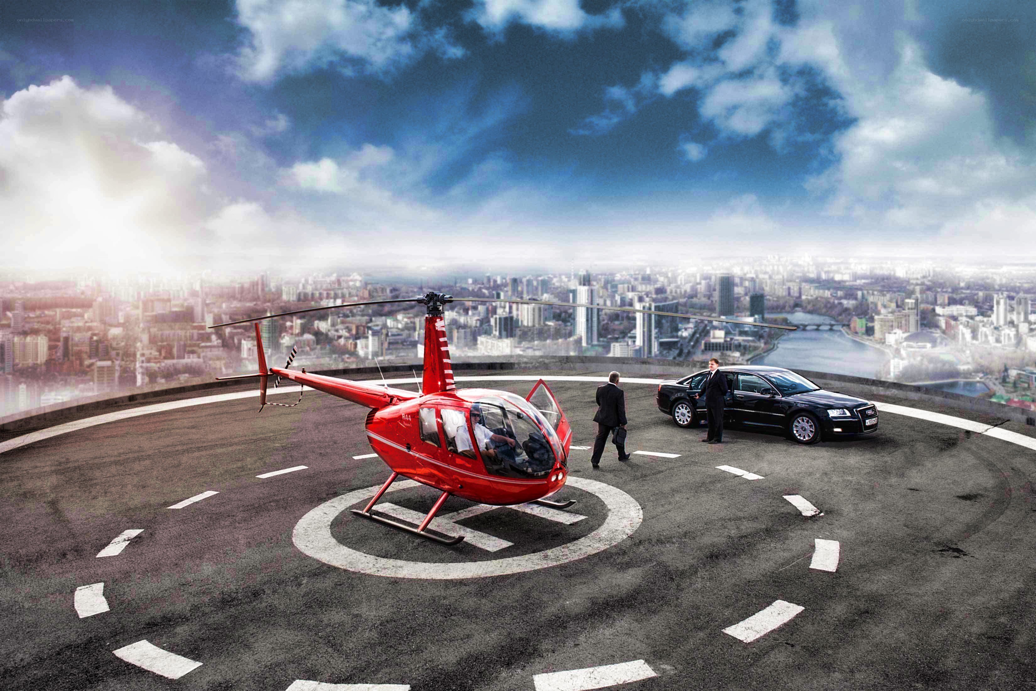 Helicopter and car on rooftop