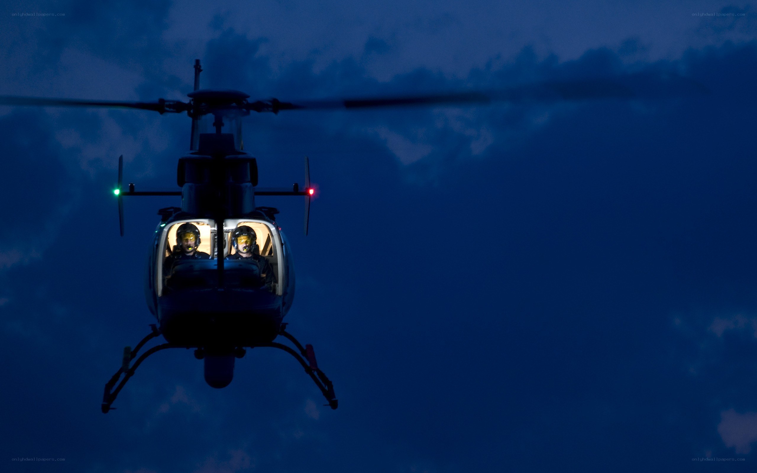 Helicopter at dusk with crew