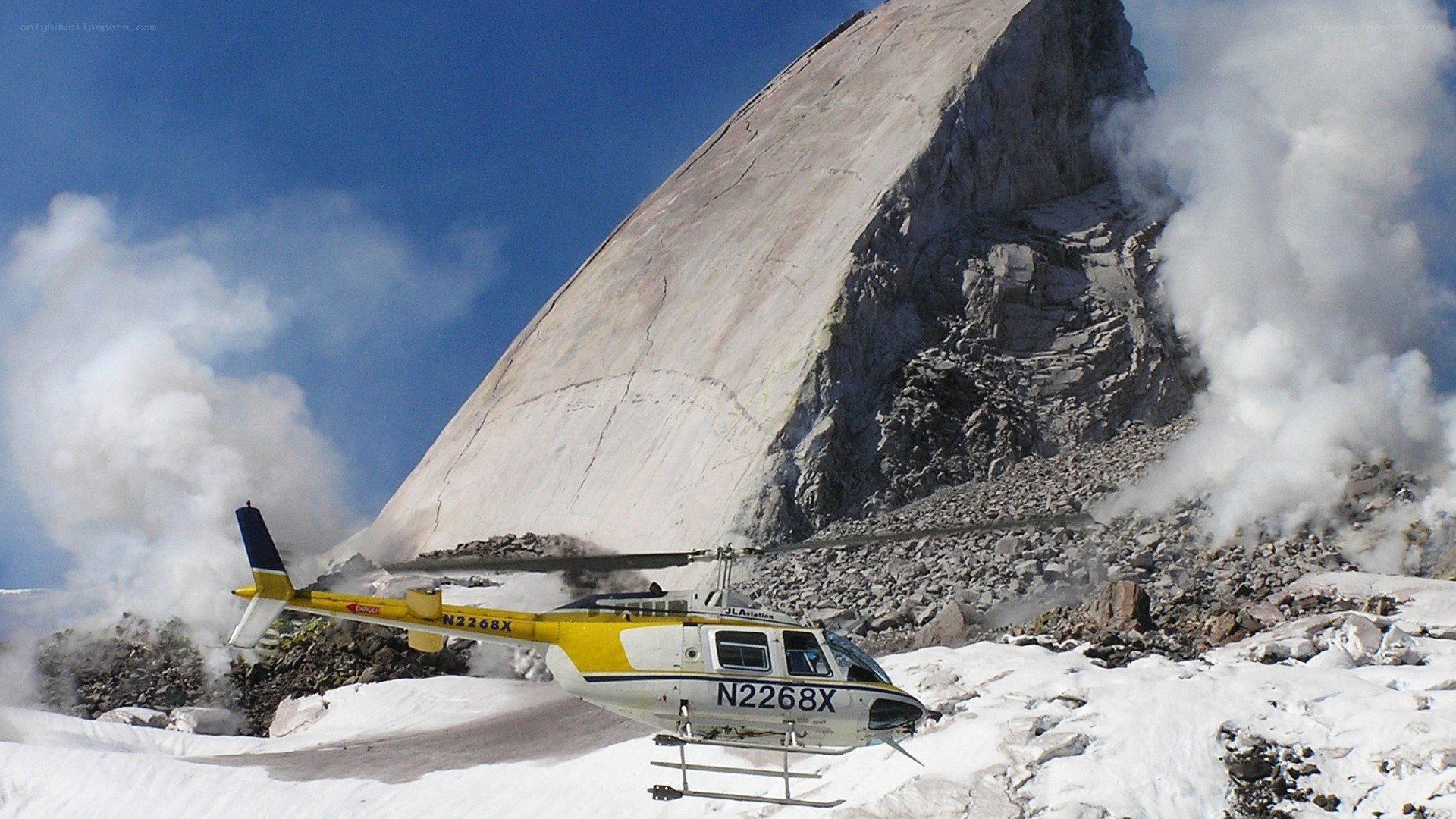 Helicopter at erupting volcano