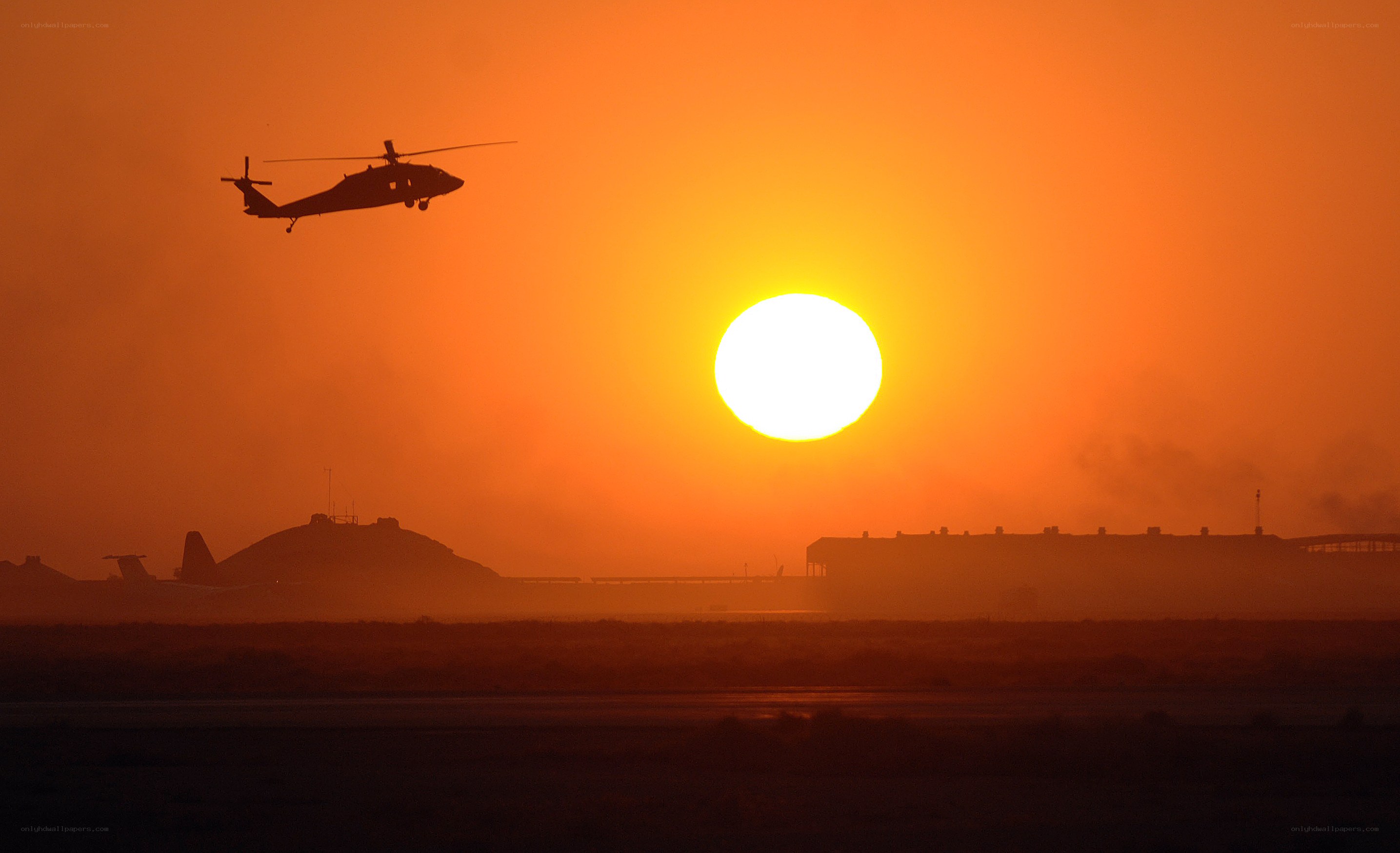 Helicopter at sunset