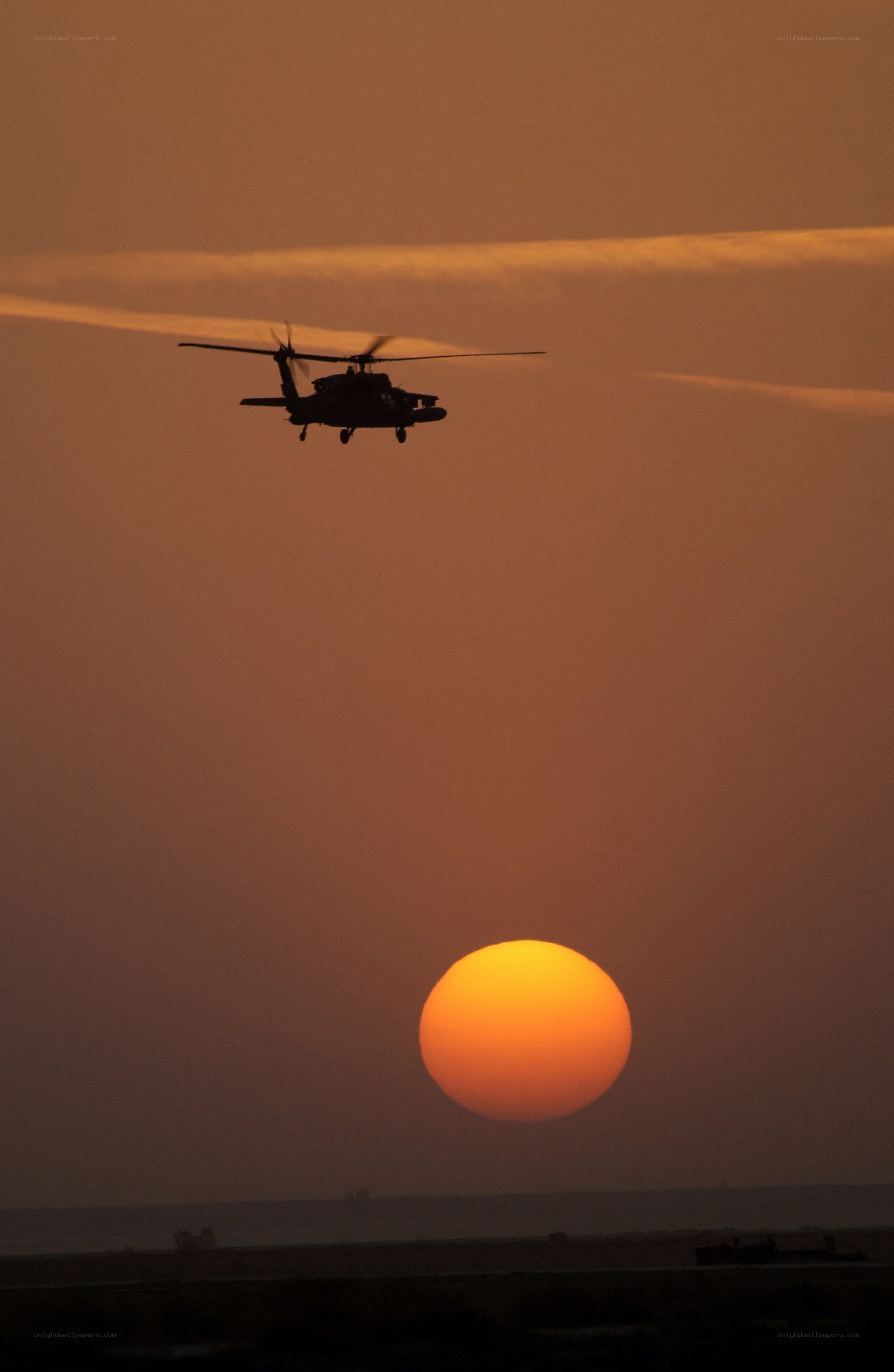 Helicopter at sunset