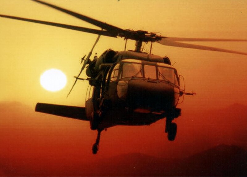 helicopter at sunset