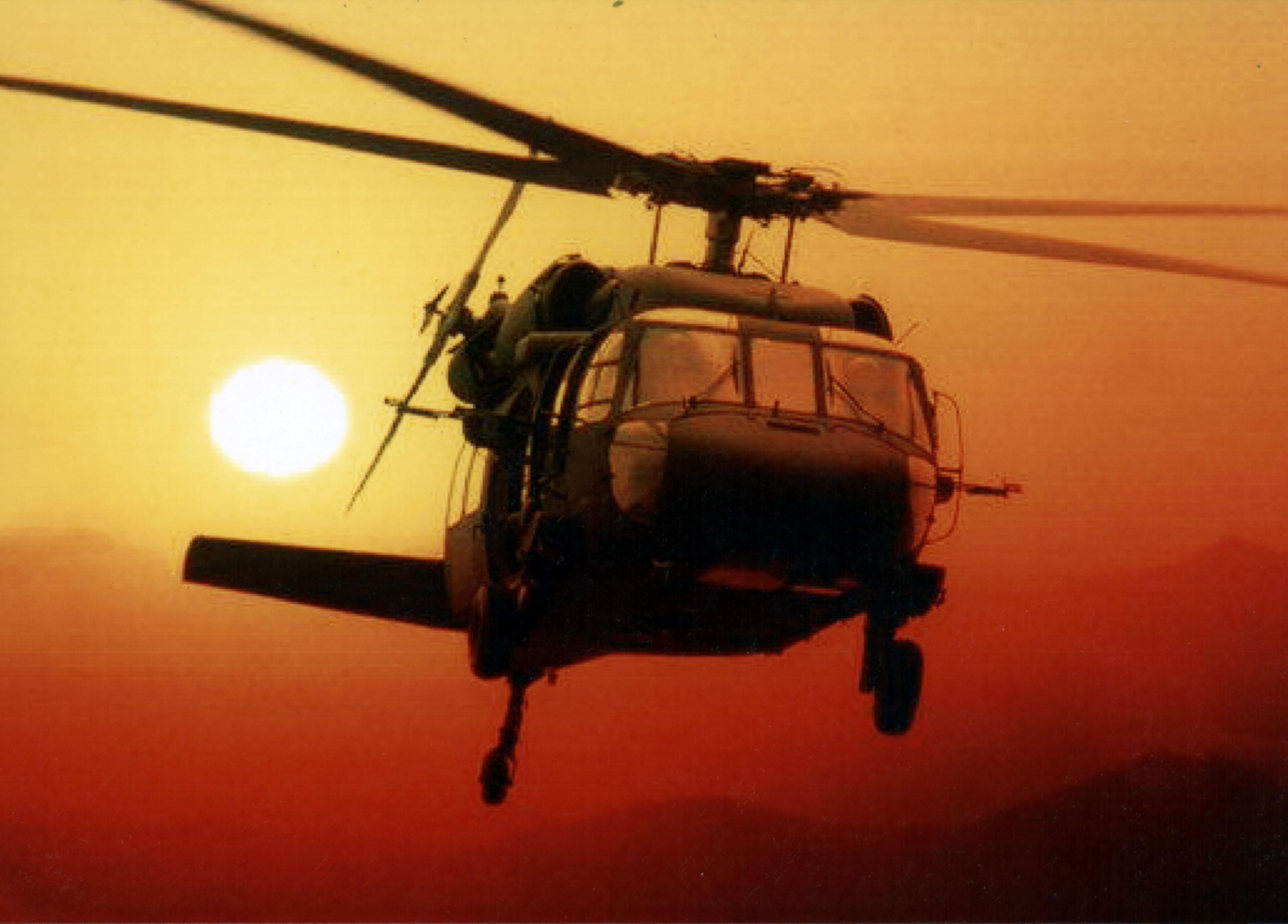 helicopter at sunset