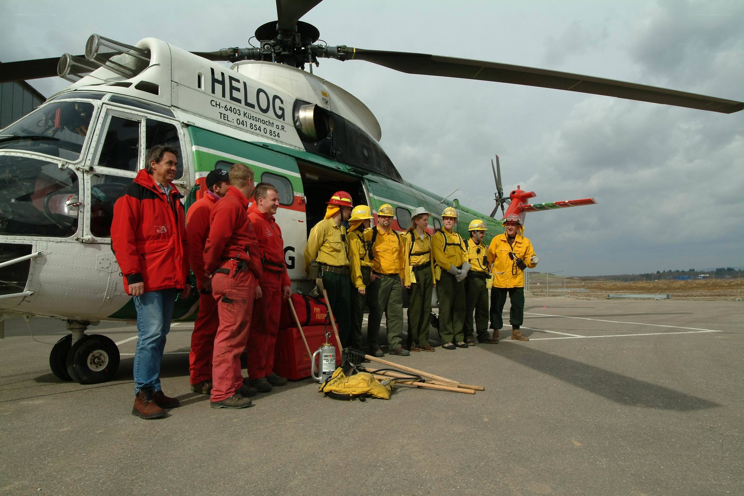 Helicopter crew and firefighters