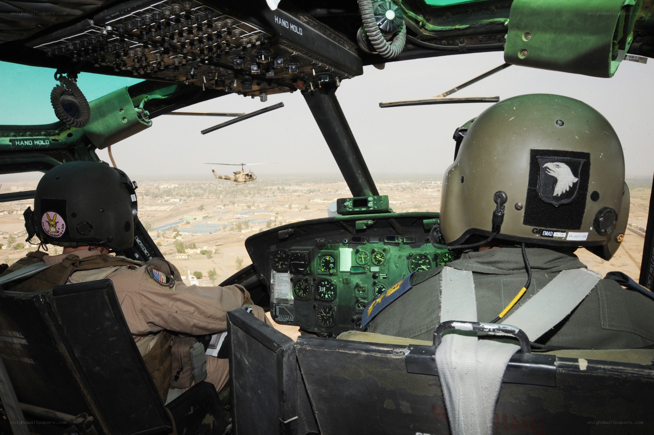 Helicopter crew in cockpit