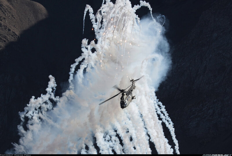Helicopter deploying flares