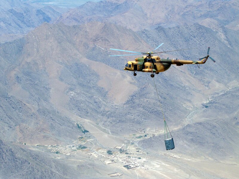 Helicopter dropping supplies