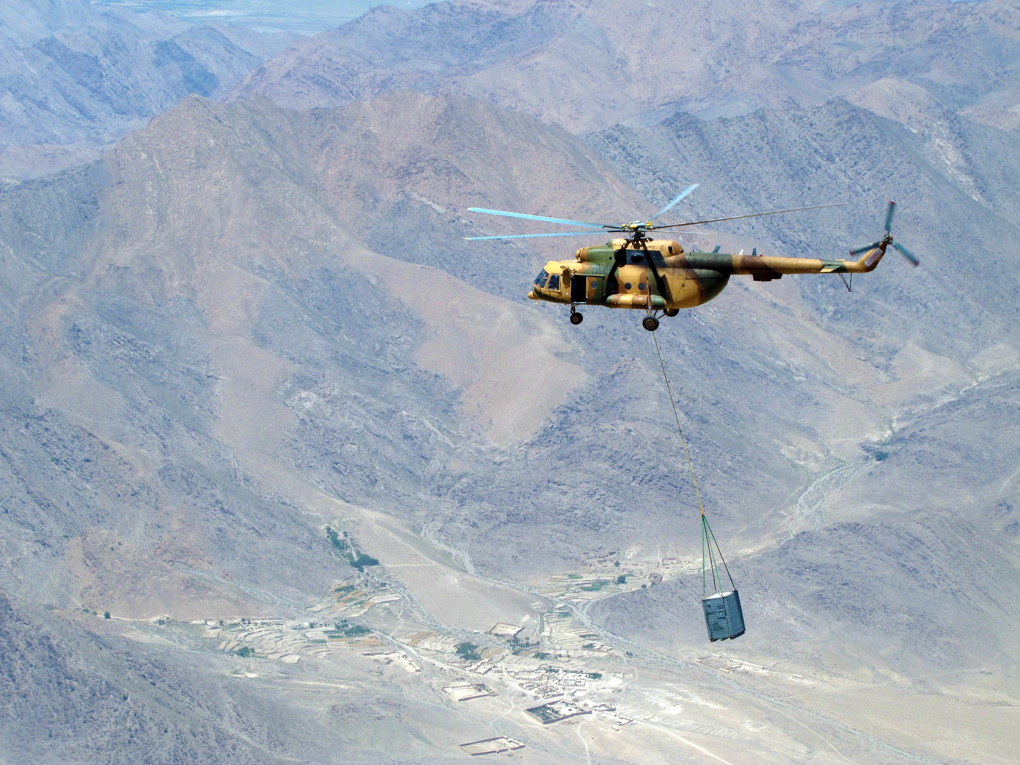 Helicopter dropping supplies