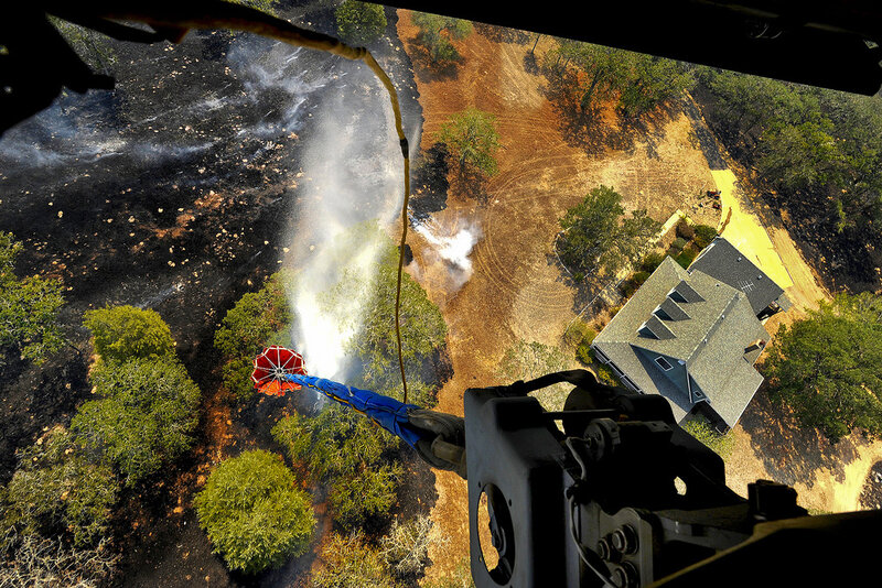 Helicopter Dropping Water