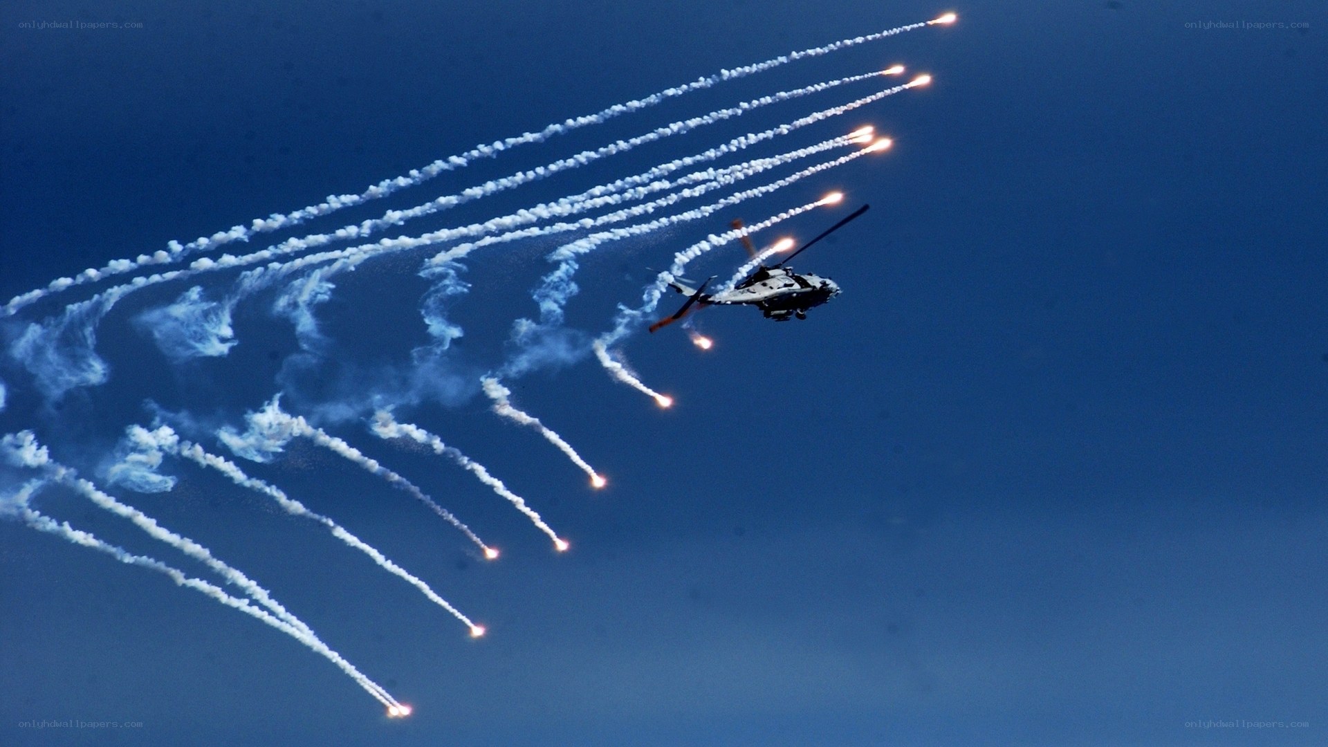 Helicopter firing flares