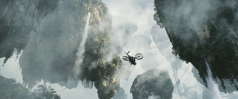 Helicopter Flying Between Cliffs — Gray, Dramatic
