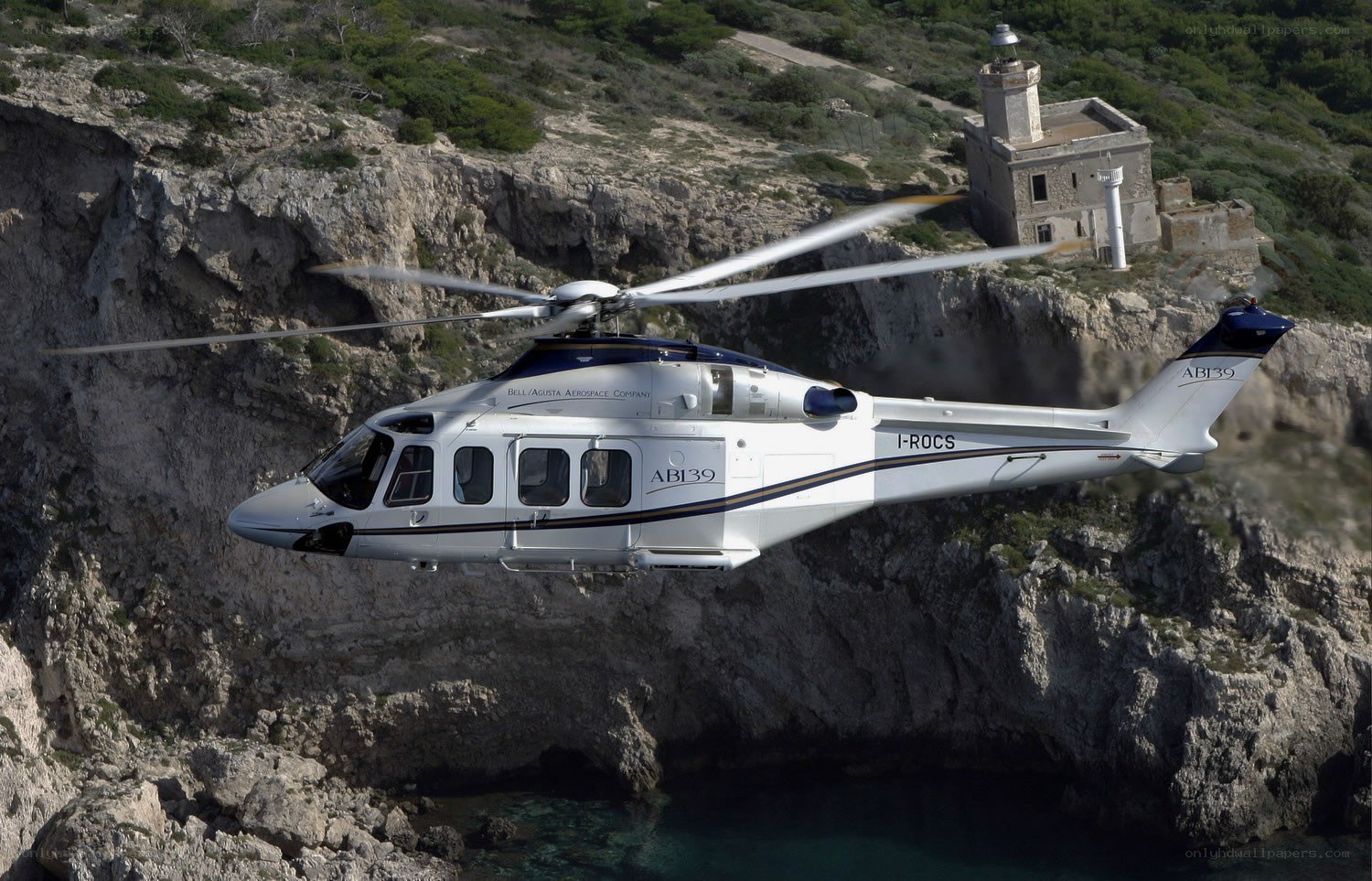 Helicopter flying near lighthouse