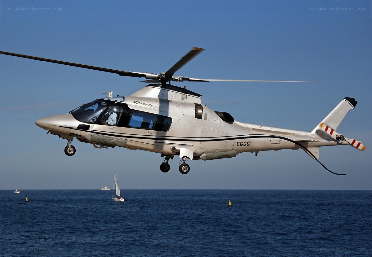 Helicopter flying over the sea