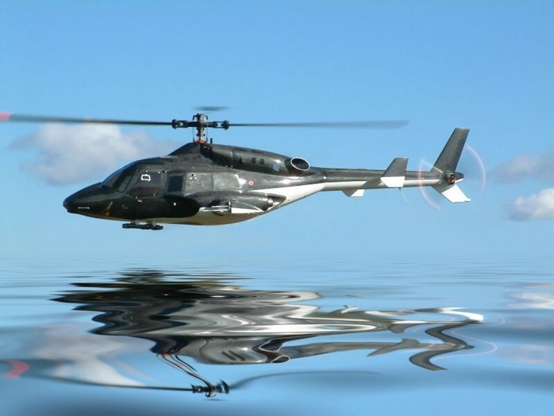 helicopter flying over water
