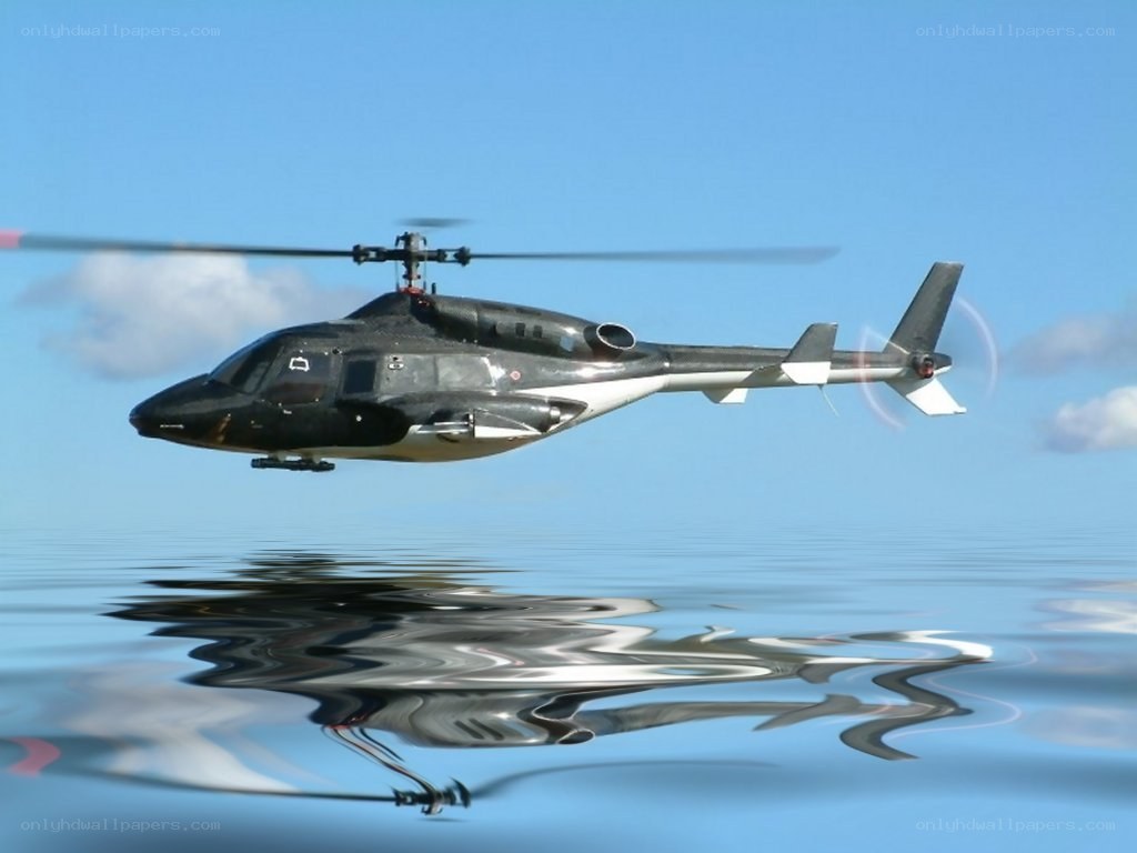 helicopter flying over water