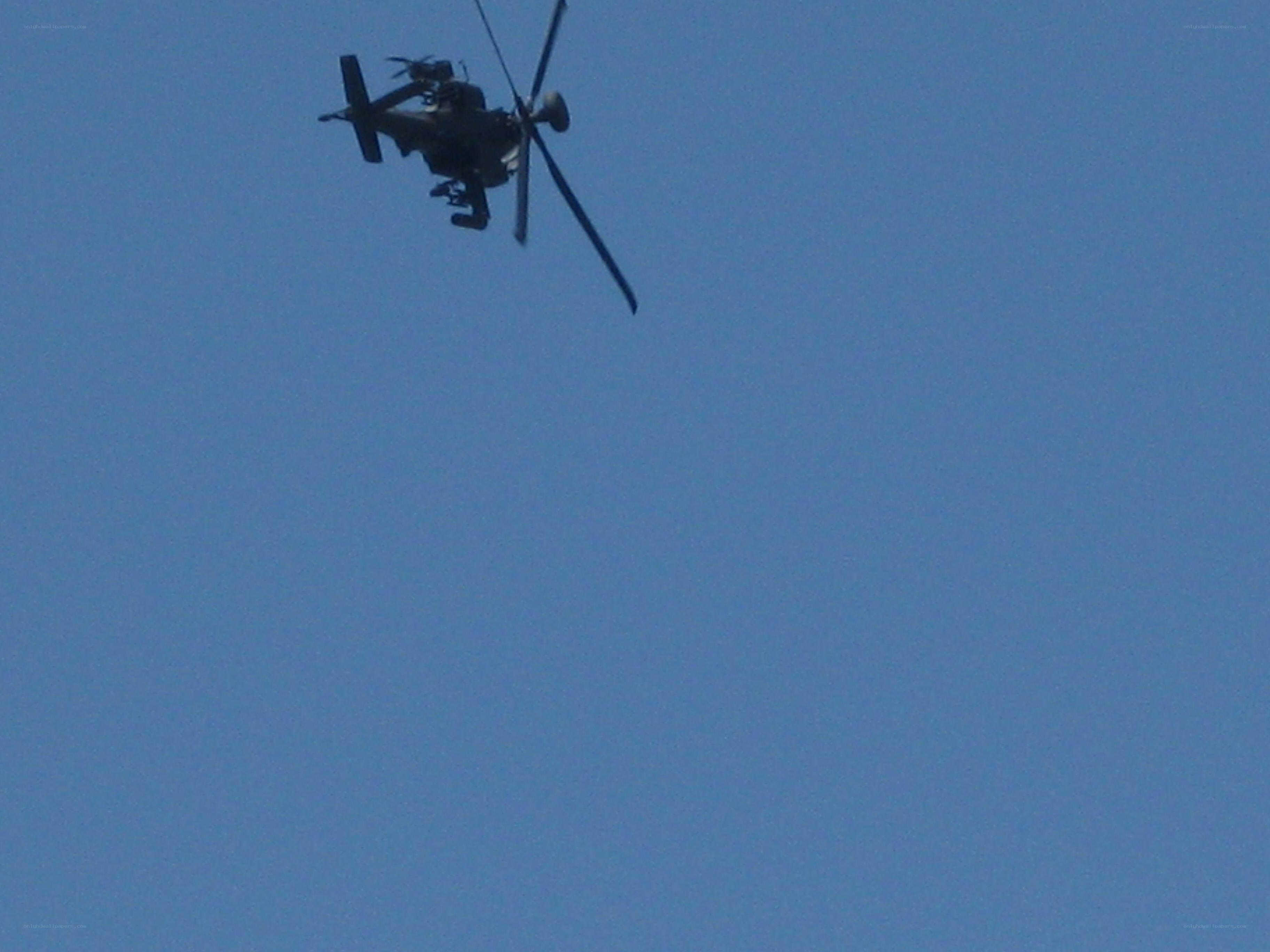 helicopter in blue sky