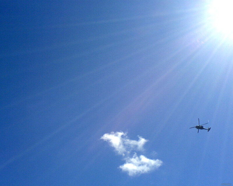 Helicopter in blue sky