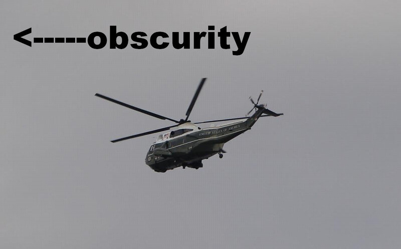 helicopter in cloudy sky
