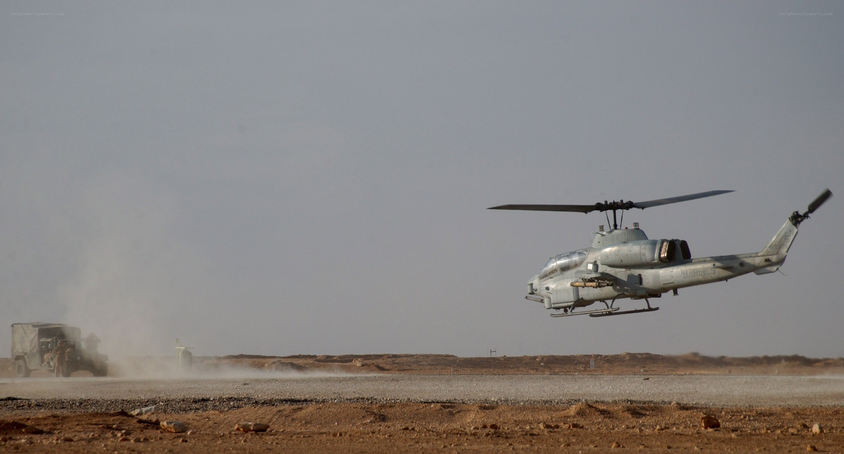Helicopter in desert terrain