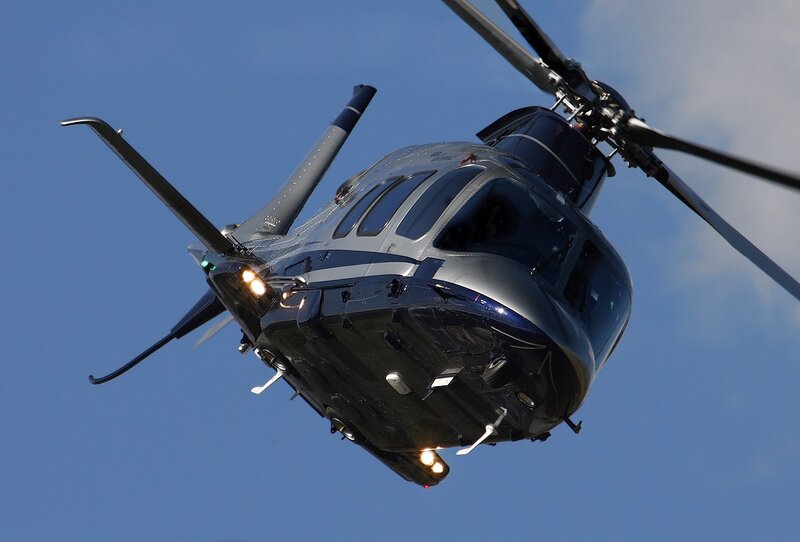 Helicopter in Flight — Blue, Dynamic, Afternoon