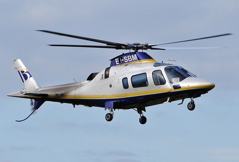 Helicopter in Flight — White, Calm, Afternoon