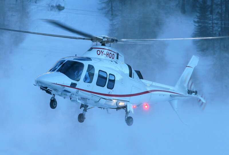 helicopter in snowy forest