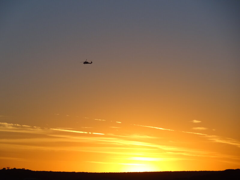 Helicopter in Sunset Sky