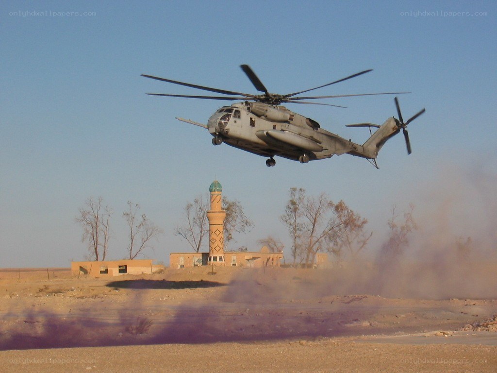 Helicopter landing in desert