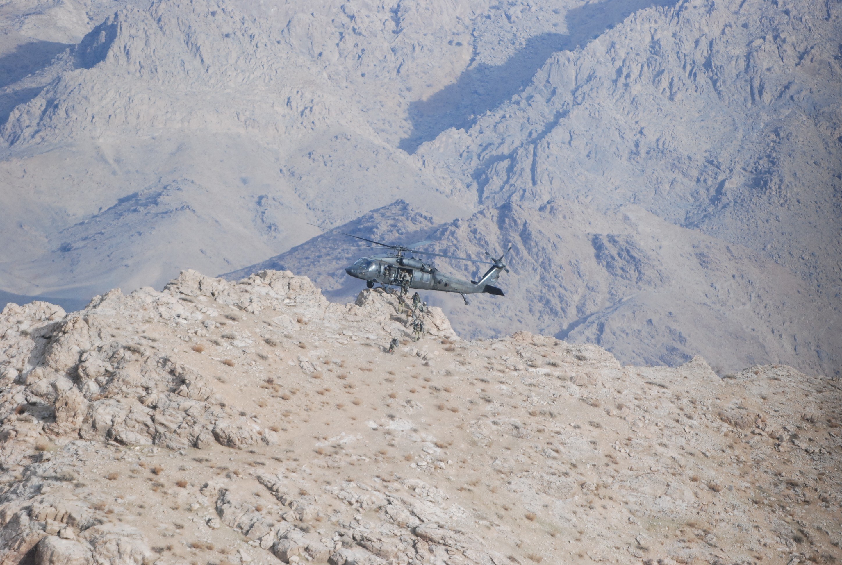 Helicopter landing on mountain