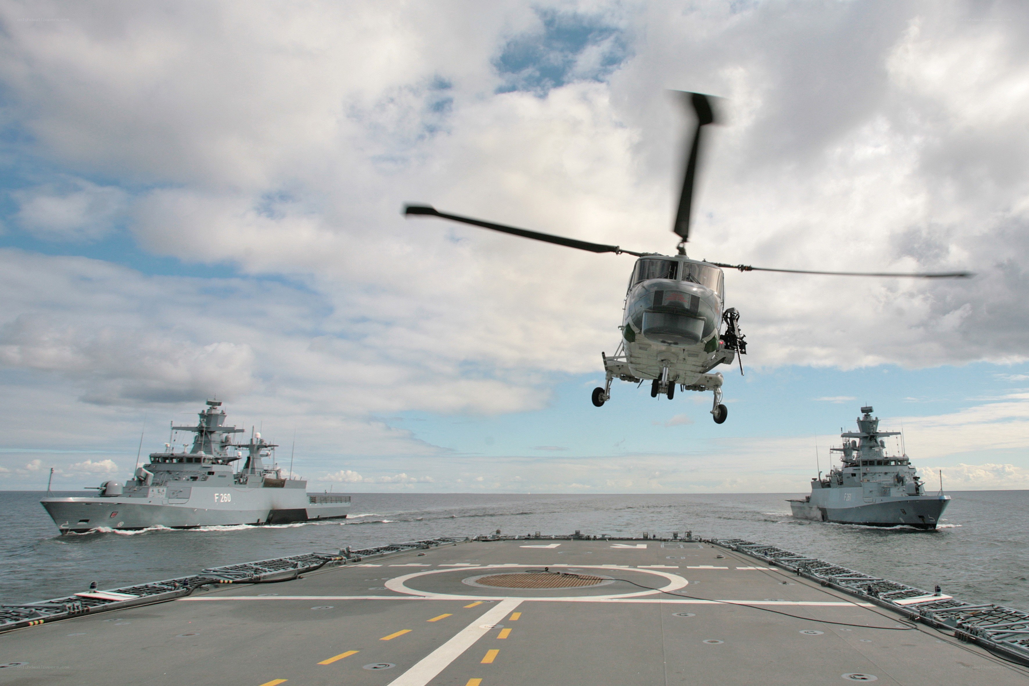 Helicopter landing on naval ship