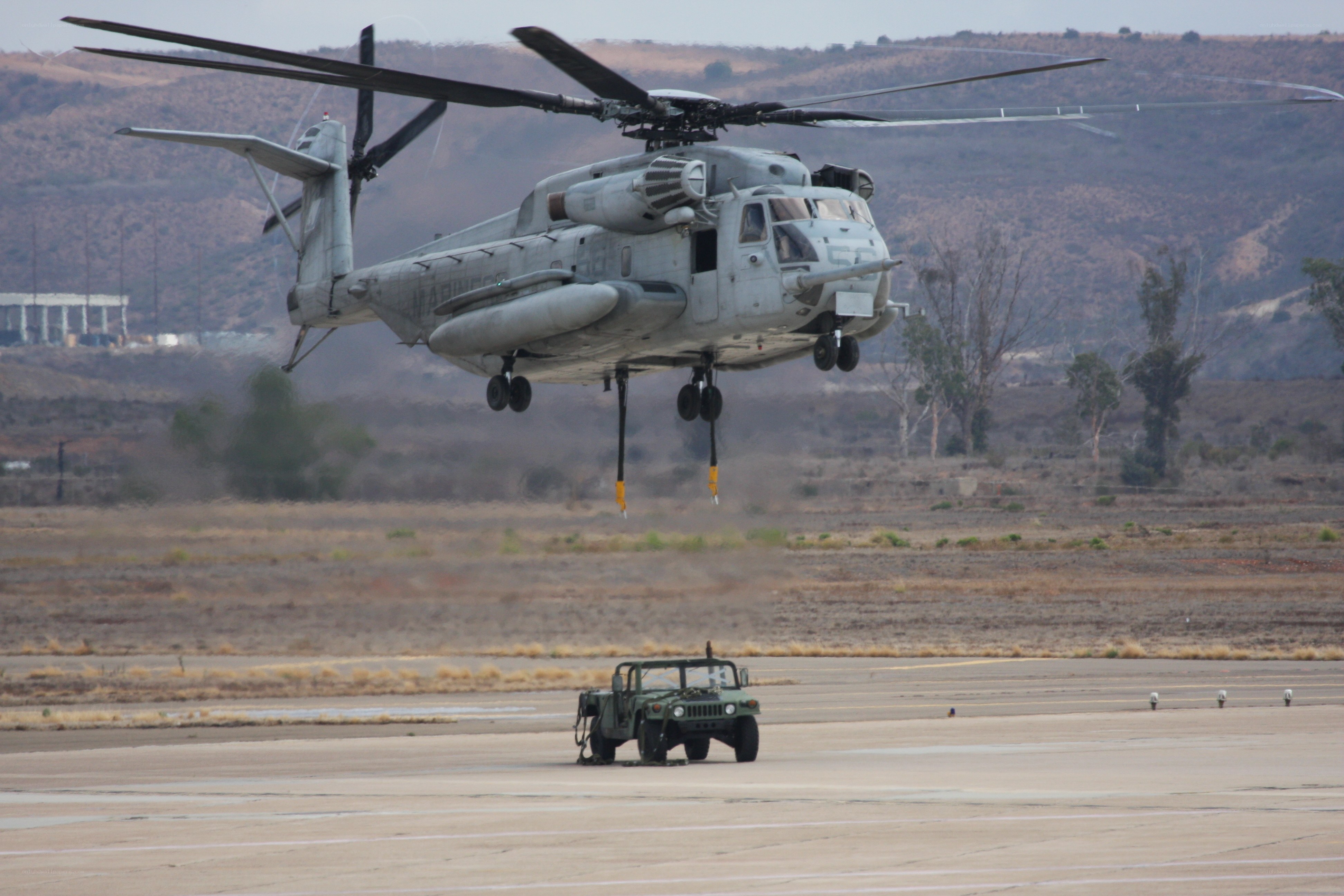Helicopter lifting a vehicle