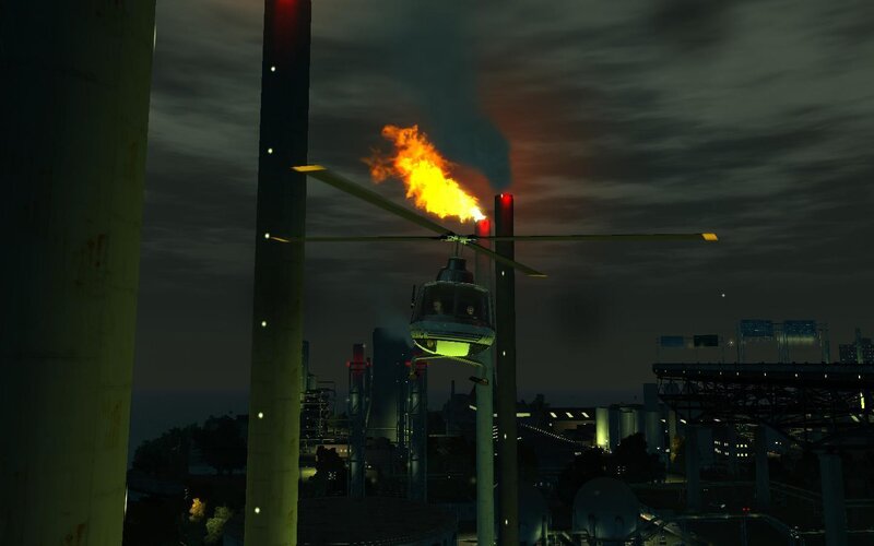 Helicopter near burning industrial plant