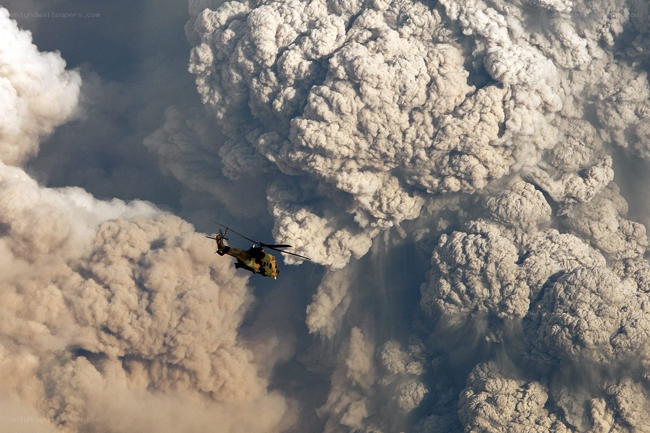 Helicopter near volcanic eruption