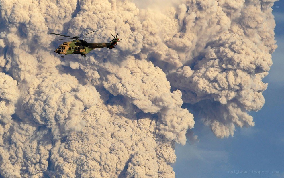 Helicopter near volcanic eruption