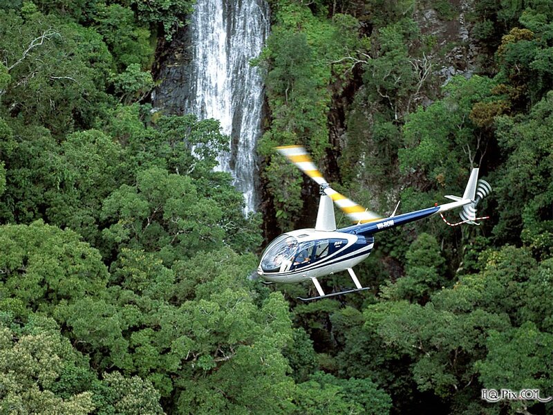 Helicopter Near Waterfall