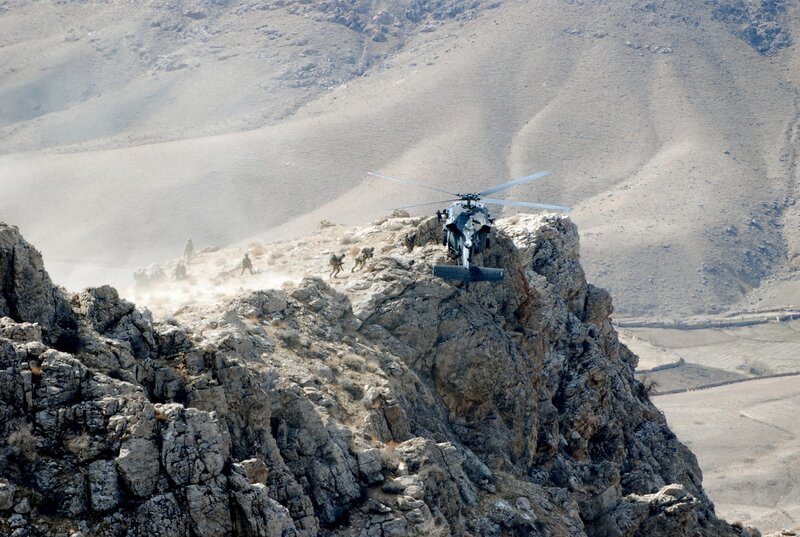 Helicopter on a mountain cliff