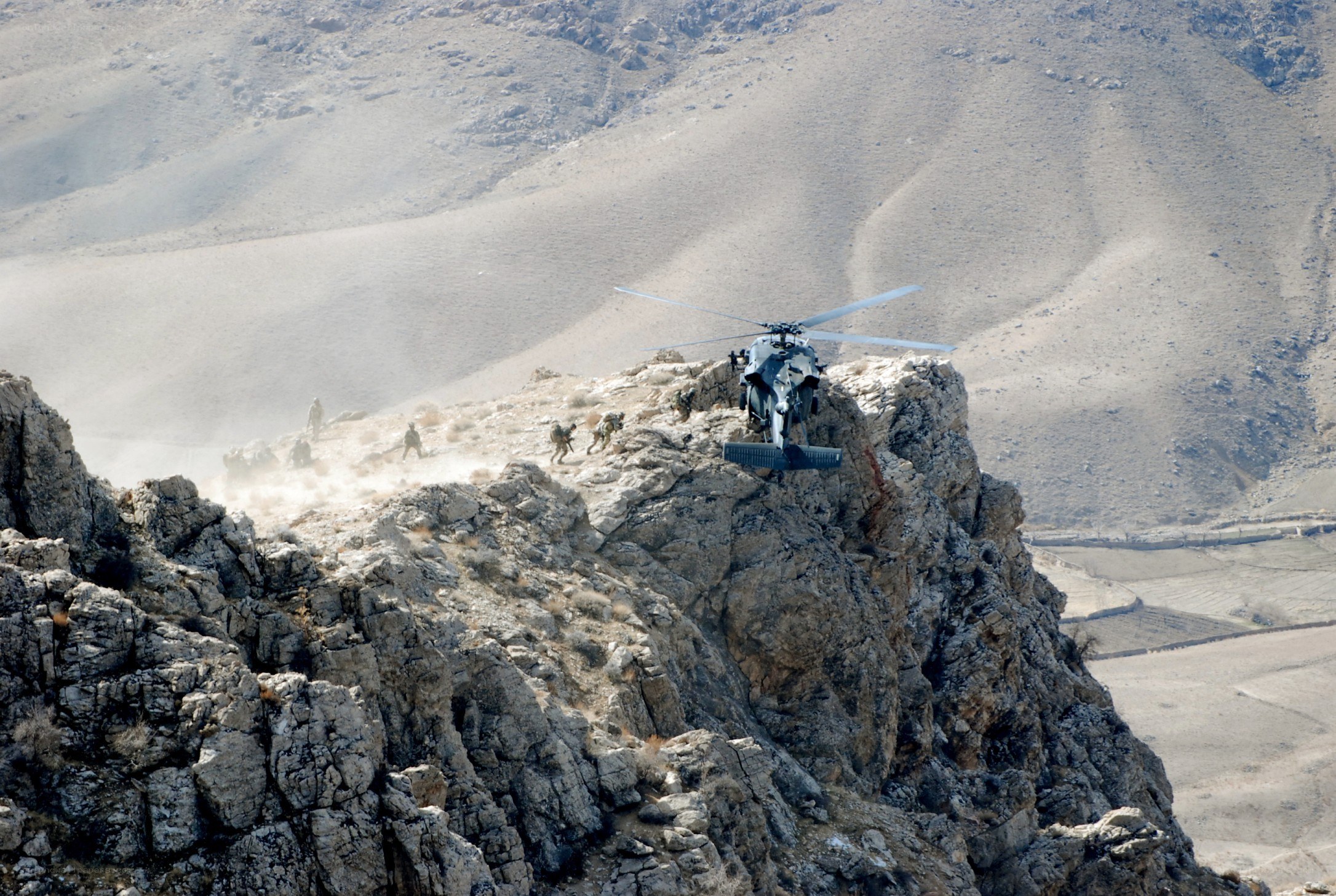 Helicopter on a mountain cliff