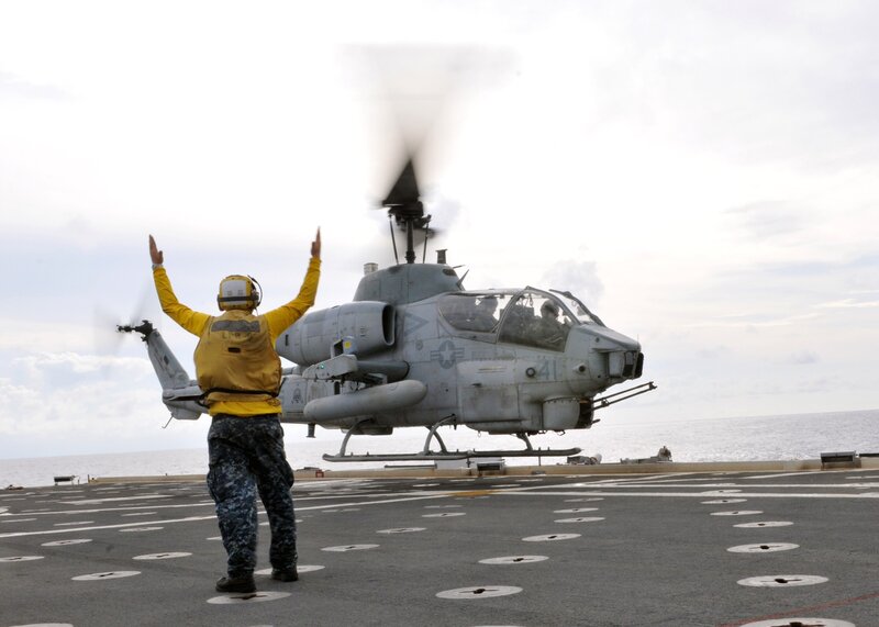 Helicopter on aircraft carrier deck