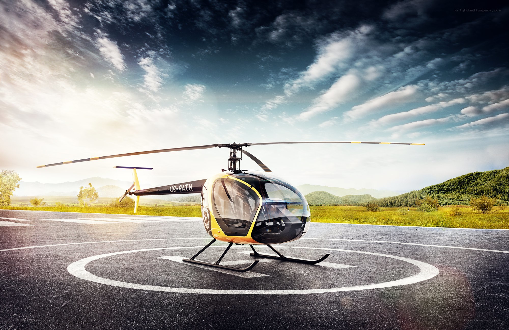 Helicopter on helipad at sunrise