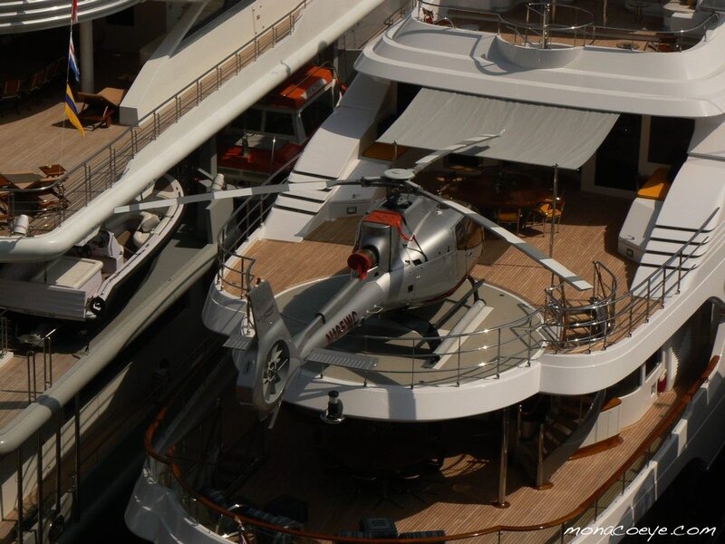 Helicopter on luxury yacht deck