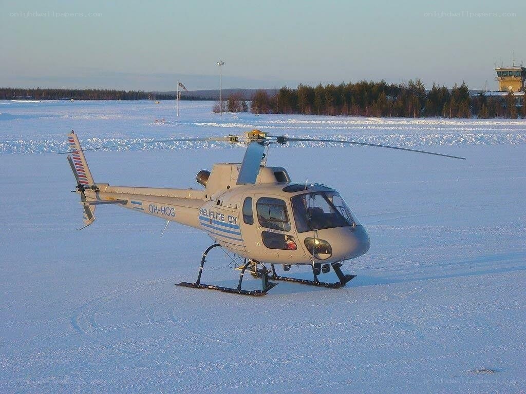 Helicopter on snowy field