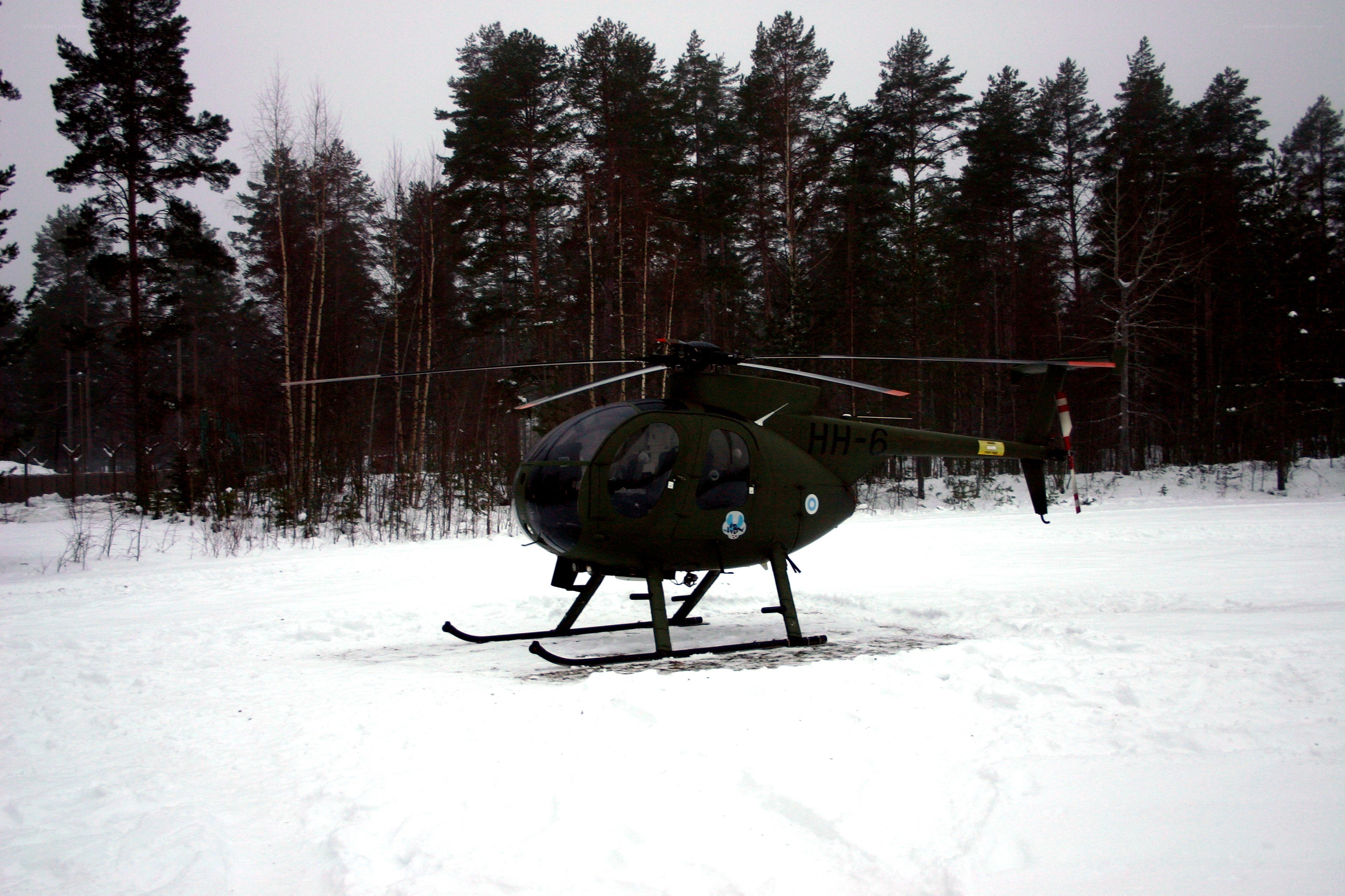 Helicopter on snowy field