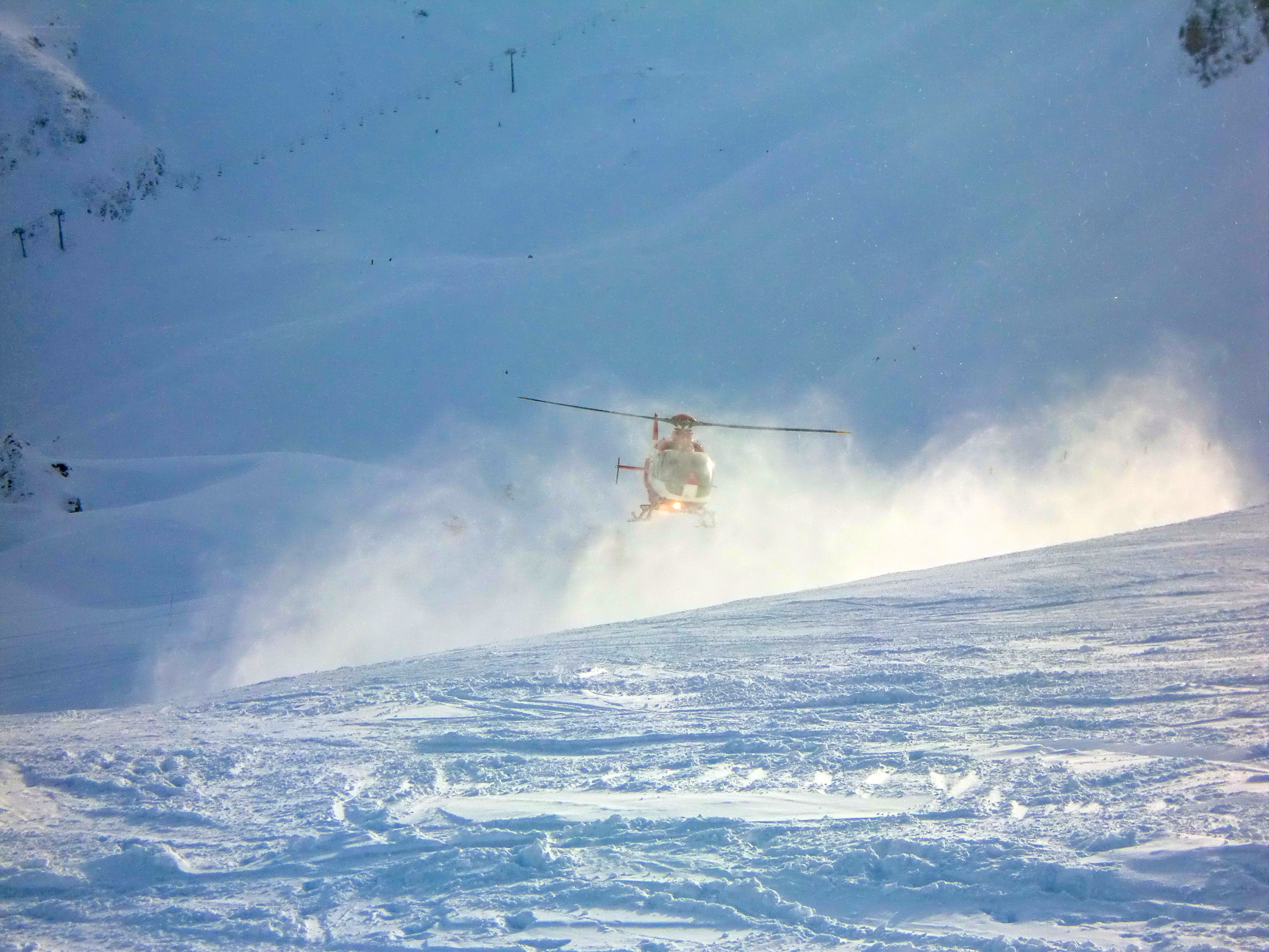 Helicopter on snowy mountain