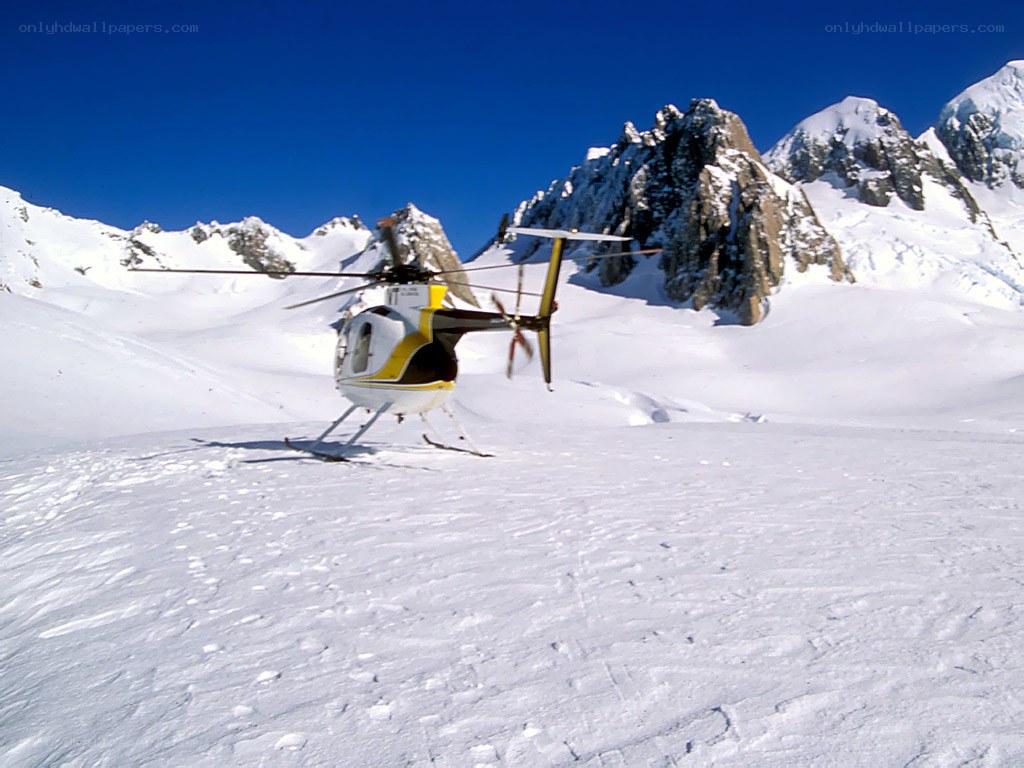 Helicopter on snowy mountain