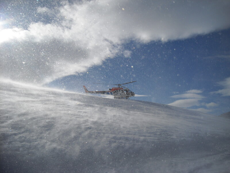 Helicopter on snowy mountain