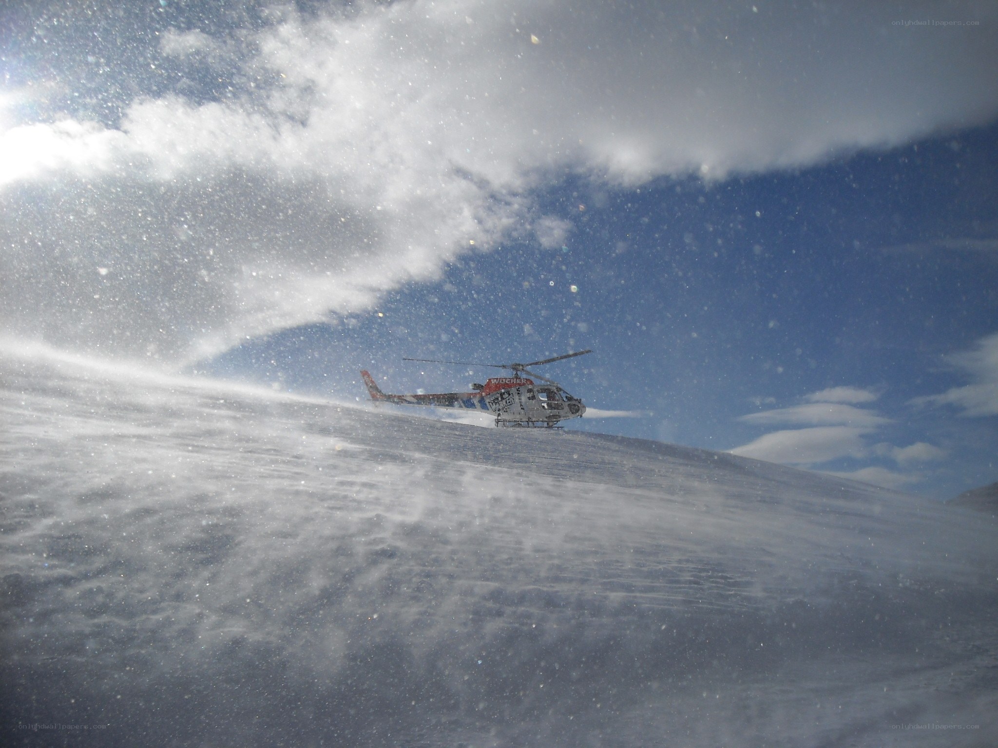 Helicopter on snowy mountain