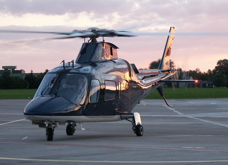 Helicopter on tarmac at dusk