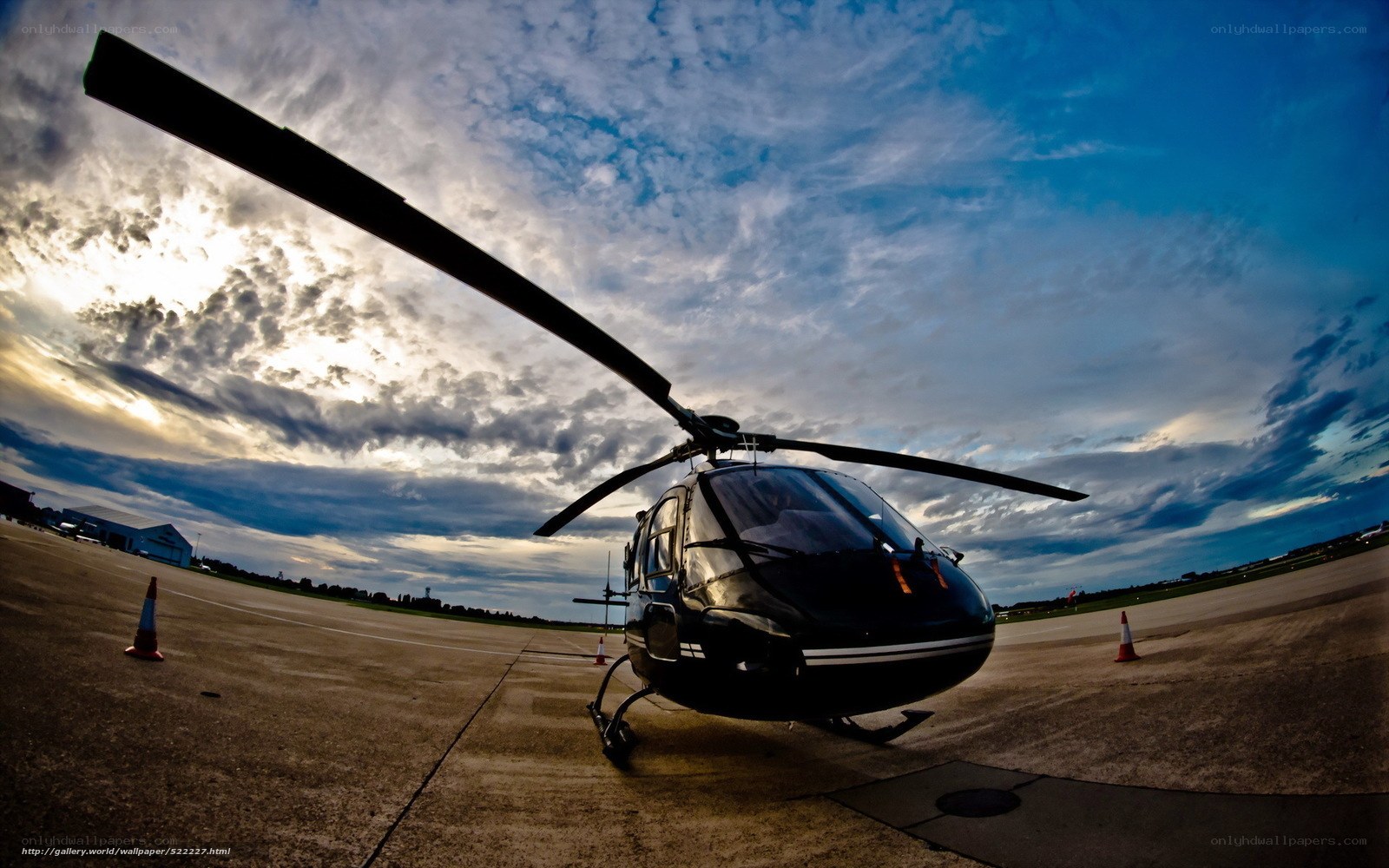Helicopter on tarmac at dusk