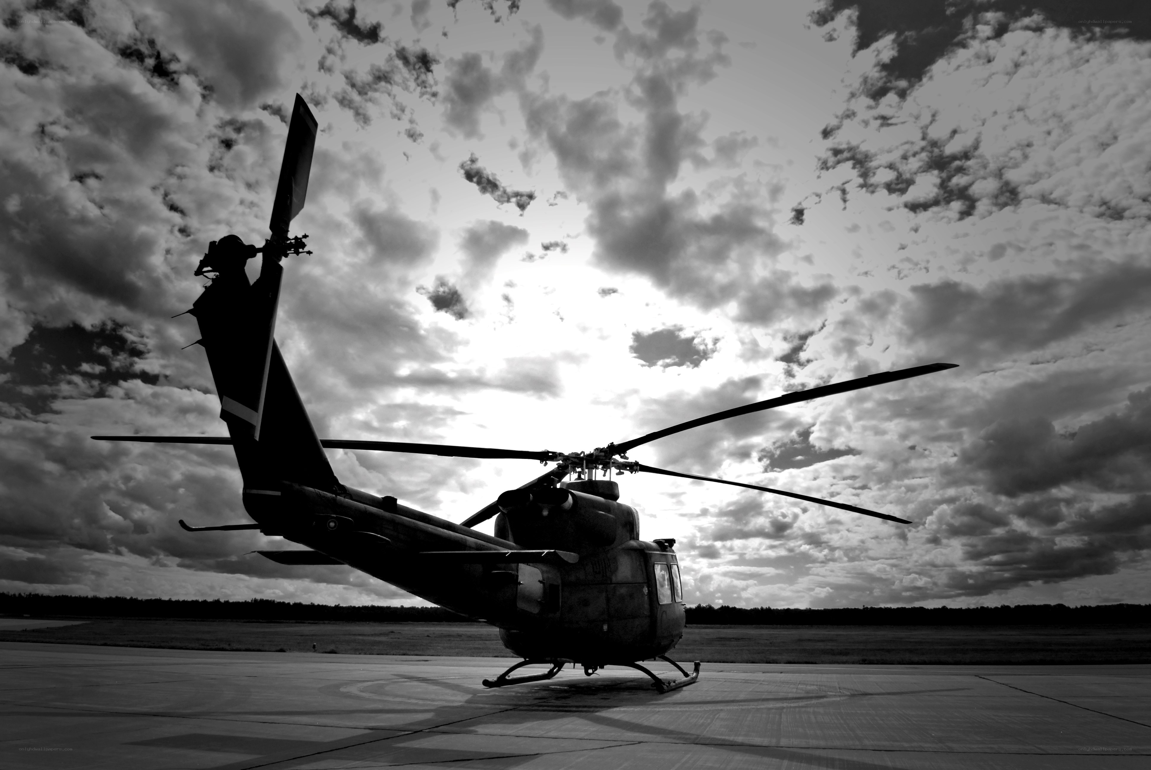 Helicopter on tarmac at sunset